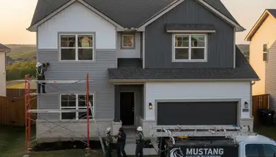 Professional vinyl siding installation on home exterior in Oklahoma City OK